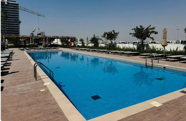 Golfville building about Emaar DHE pool